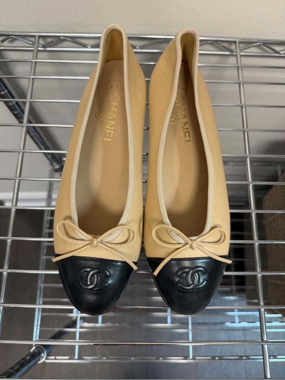 CHANEL Beige and Black Leather Cap-Toe Ballerina Flats
